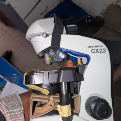 Olympus CX23 microscope with binocular viewing head, revolving objective lenses, mechanical stage and focusing controls.