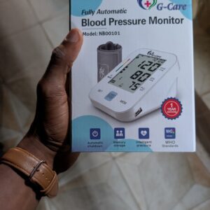 G-Care fully automatic upper-arm blood pressure monitor box showing digital display, cuff, and memory icons.